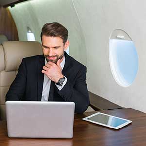 businessman-on-private-jet-2021-09-01-19-52-32-utc